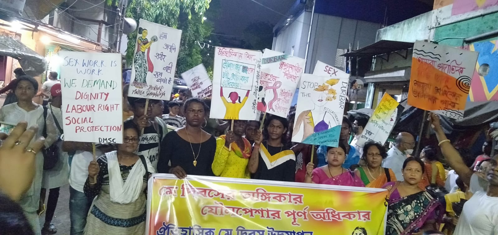 Smiling women with flowers held walking