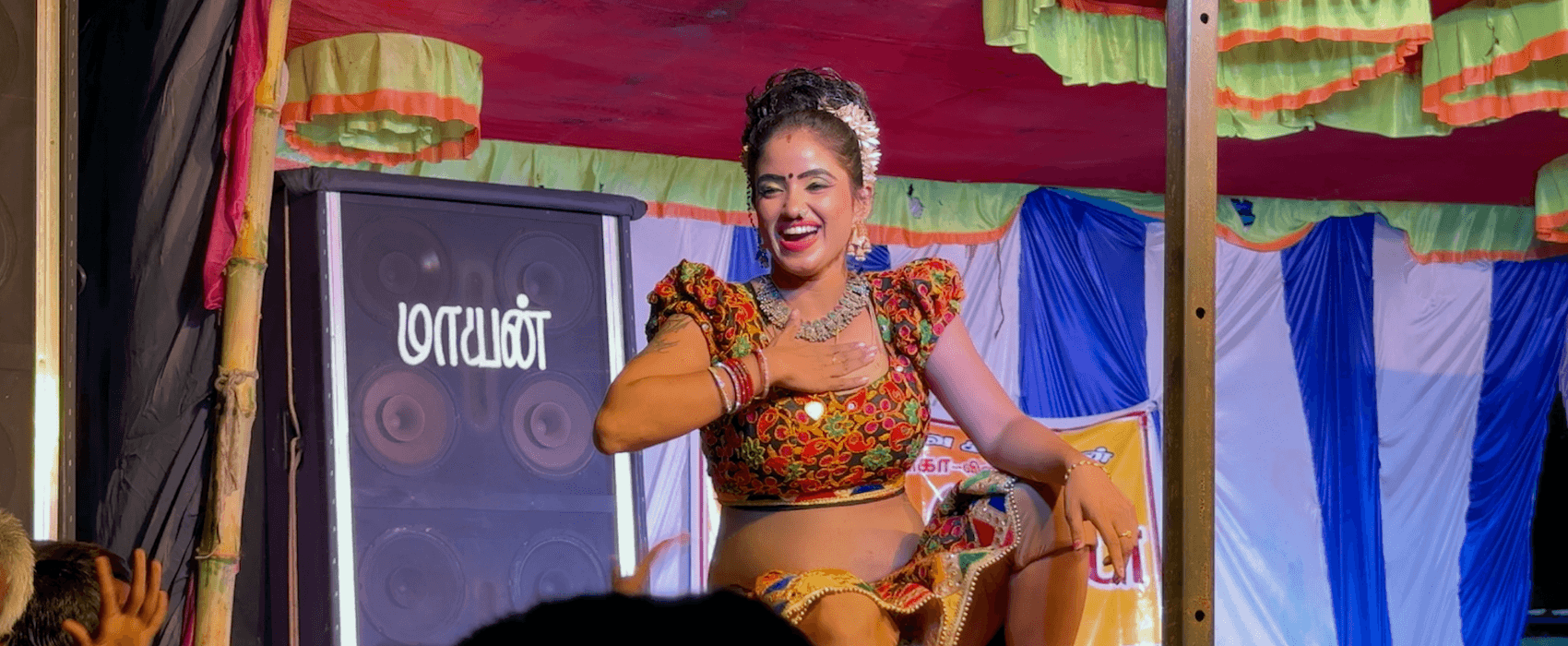 Erotic dancer engaging with the audience